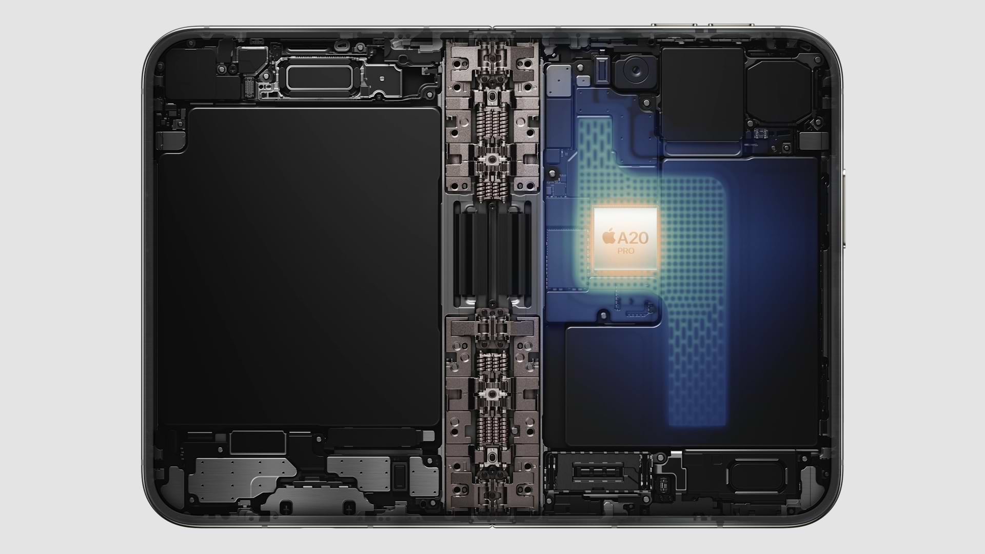 מבט פנימי על iPhone Duo: שבב A20 Pro מחובר לתא אידוי ייעודי, עם סוללה בכל אחד מצדי הציר. צילום: Apple
