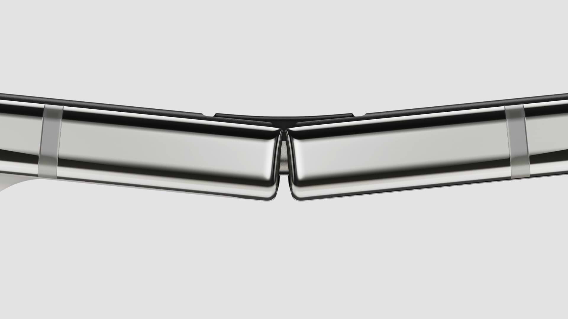 הציר של iPhone Duo מקרוב: טיטניום מלוטש כמראה עם כיסוי ציר מודפס בתלת-ממד. צילום: Apple